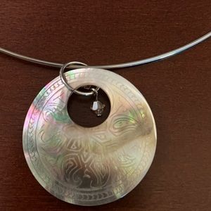 Loop necklace with abalone shell medallion.